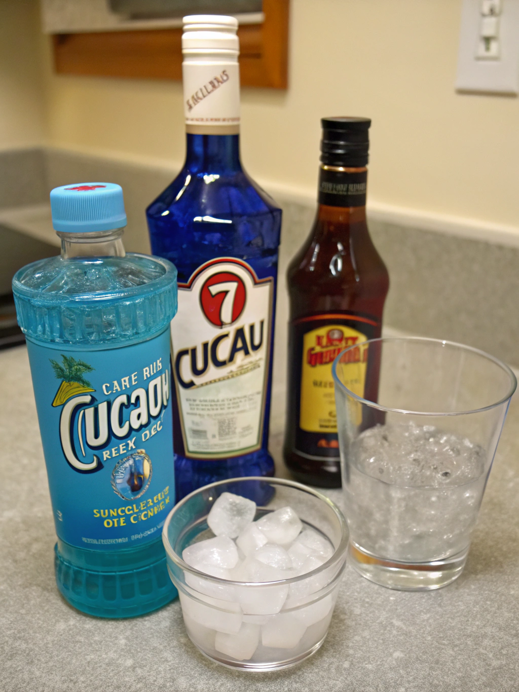 Vegas Bomb Ingredients: Crown Royal, peach schnapps, cranberry juice, Red Bull, cocktail shaker, shot glasses